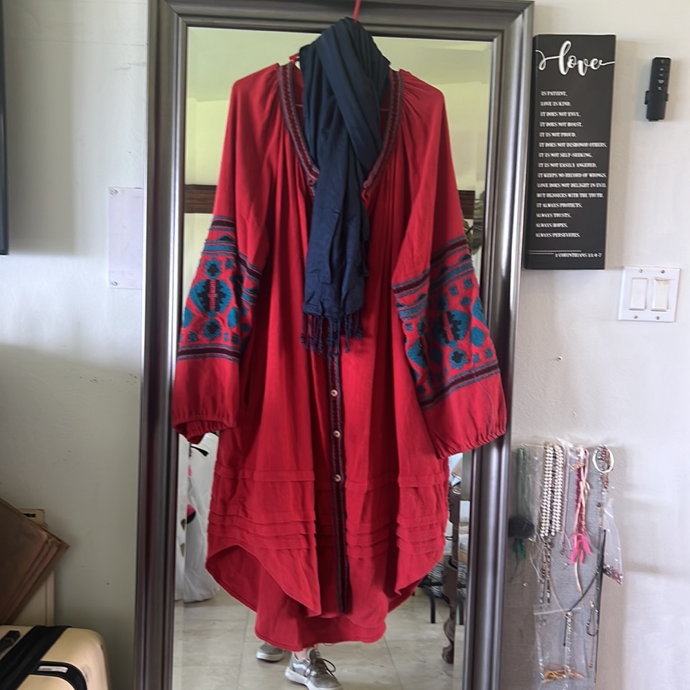 It is a great piece to wear in the fall as a dress or over jacket. Is cotton